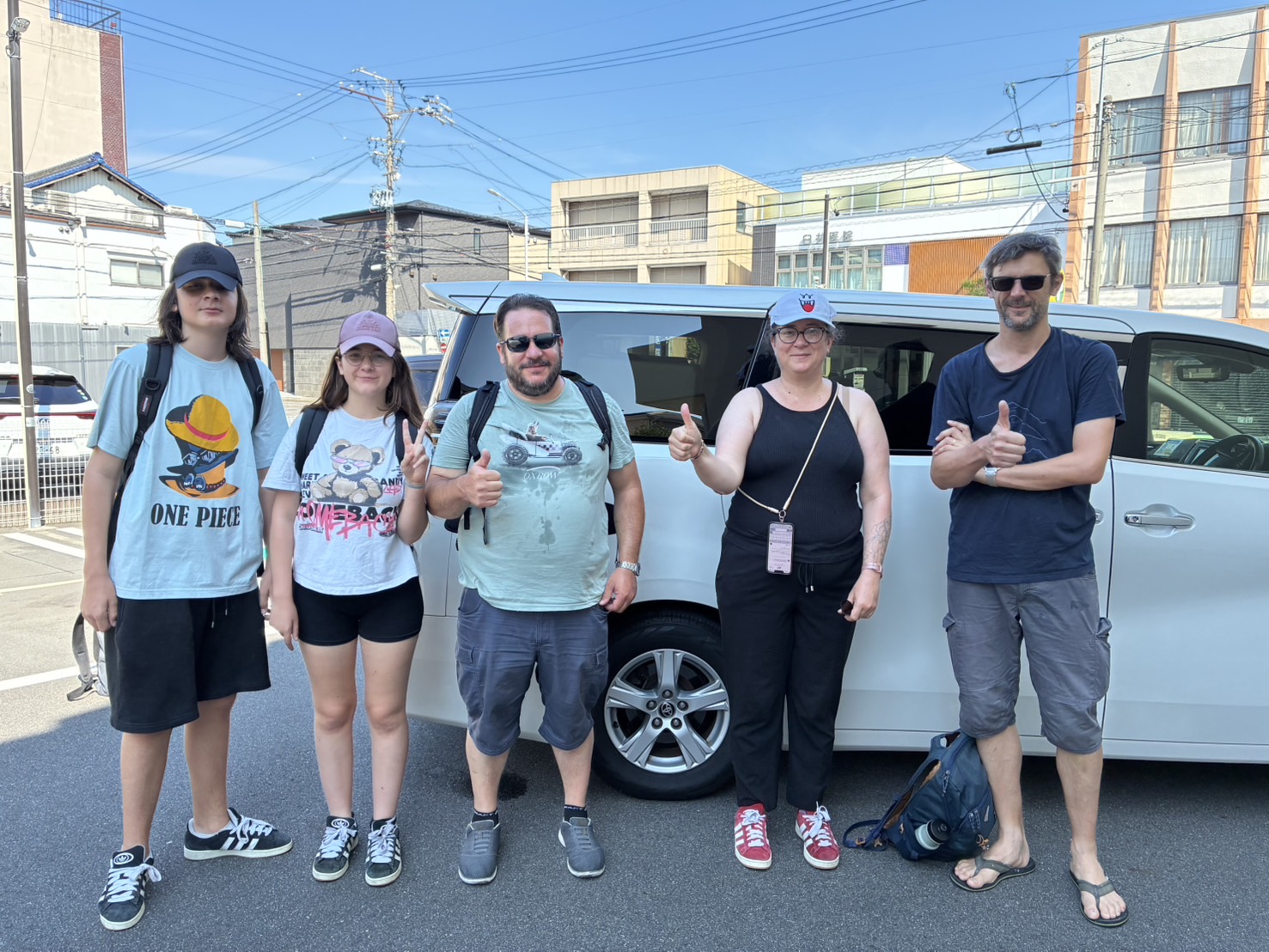 Guests in front of the Alphard at Shirakawa-go tour