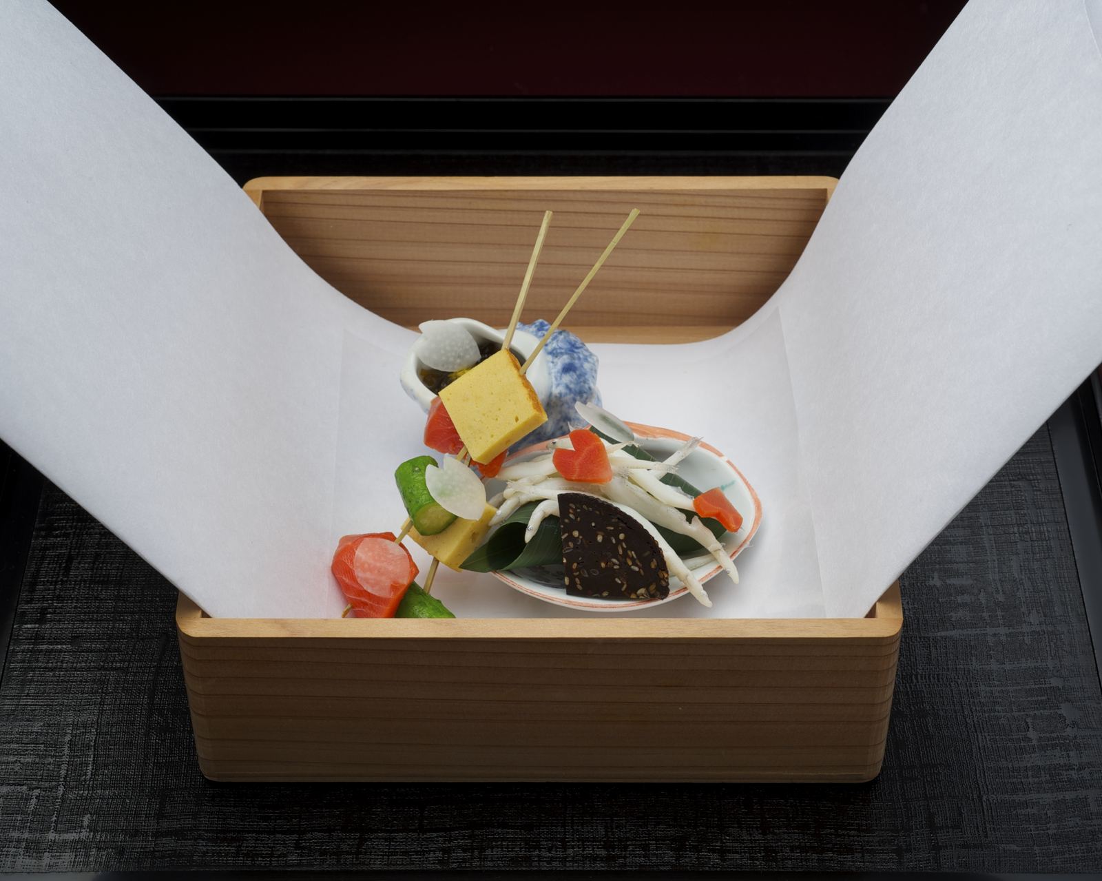 Hassun, a seasonal appetizer selection served in a wooden box