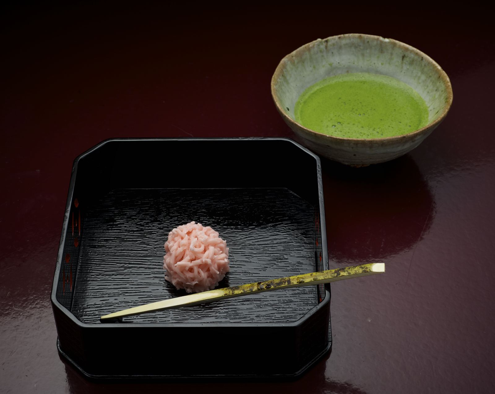Thin matcha tea served with a seasonal wagashi sweet